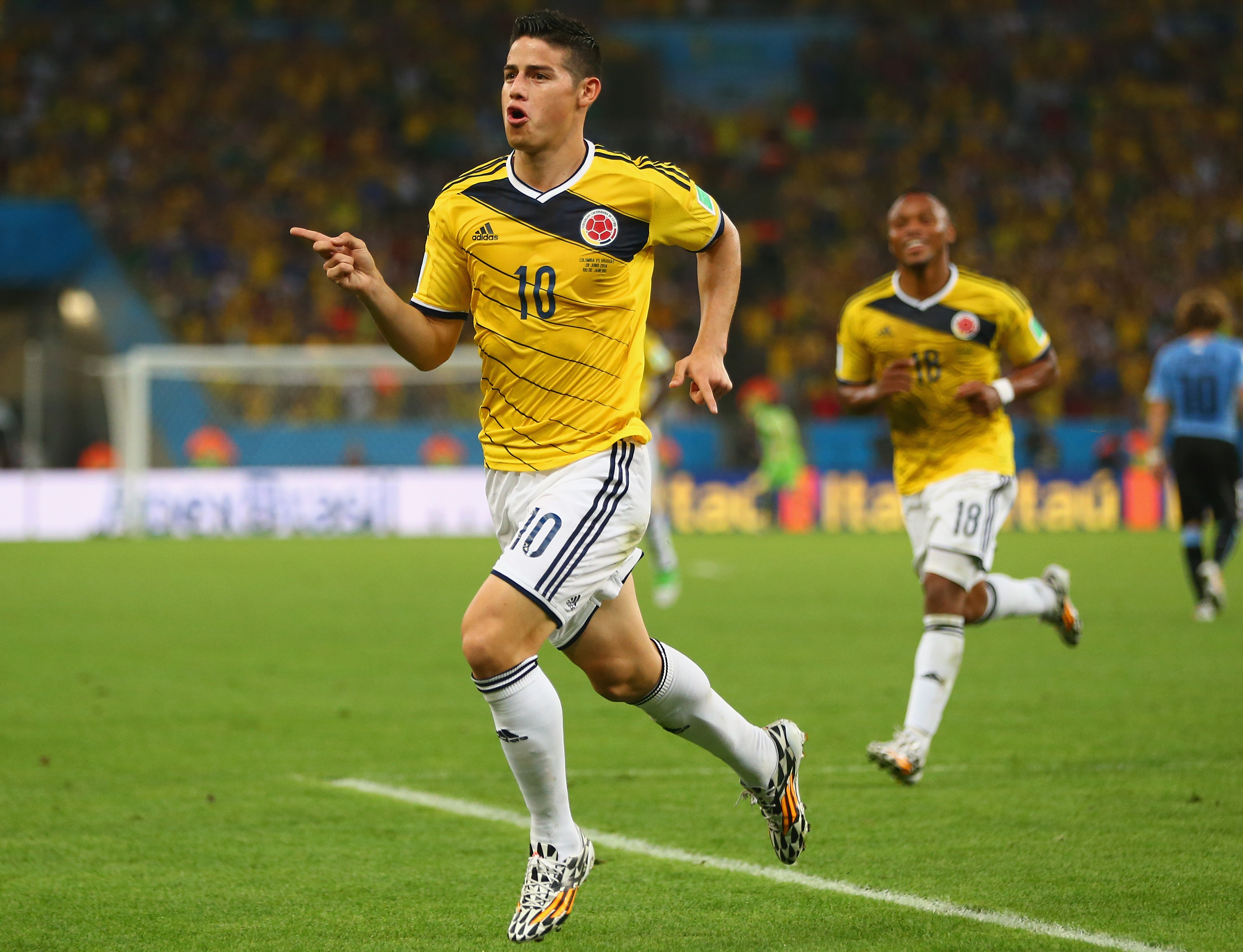 RIO DE JANEIRO, BRAZIL - JUNE 28: James Rodriguez of Colombia celebrates scoring his team's first goal during the 2014 FIFA World Cup Brazil round of 16 match between Colombia and Uruguay at Maracana on June 28, 2014 in Rio de Janeiro, Brazil. (Photo by Jamie Squire/Getty Images)