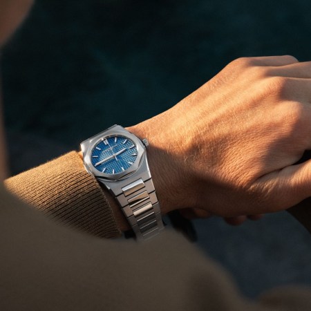 a model wearing the new Girard-Perregaux Laureato Fifty
