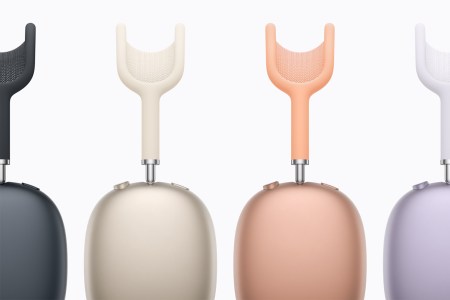 Four pairs of headphones shown from the side, including grey, tan, orange and purple colors