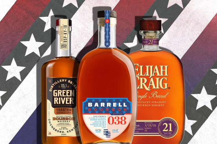 Three whiskey bottles in front of stars and stripes