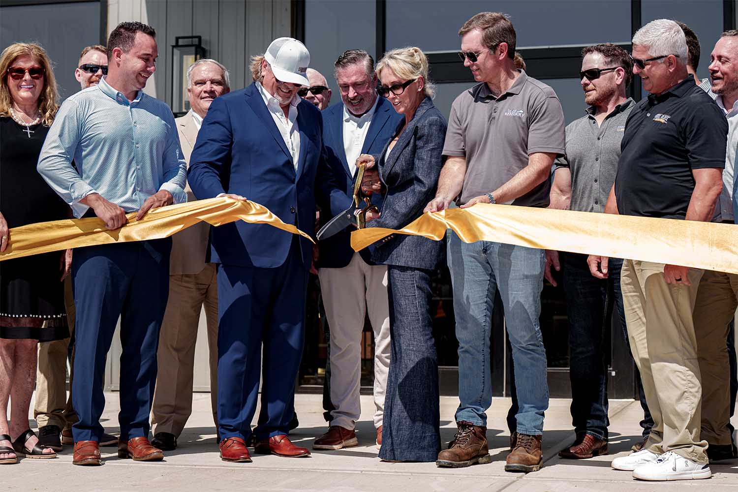 The opening of Horse Soldier's distillery on Fourth of July weekend. (Left to right) Somerset Kentucky Mayor Alan Keck, Kentucky Senator Robert Stivers, Horse Soldiers founders John Koko, Scott Neil and Elizabeth Pritchard-Koko, alongside Kentucky Governor Andy Beshear.