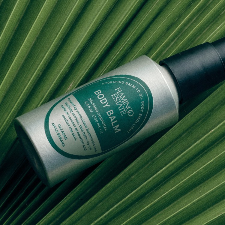 Bottle of Banana Balm on a leaf