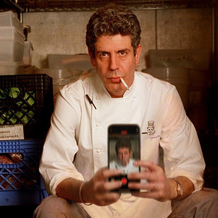 Anthony Bourdain taking a selfie with a cigarette in his mouth