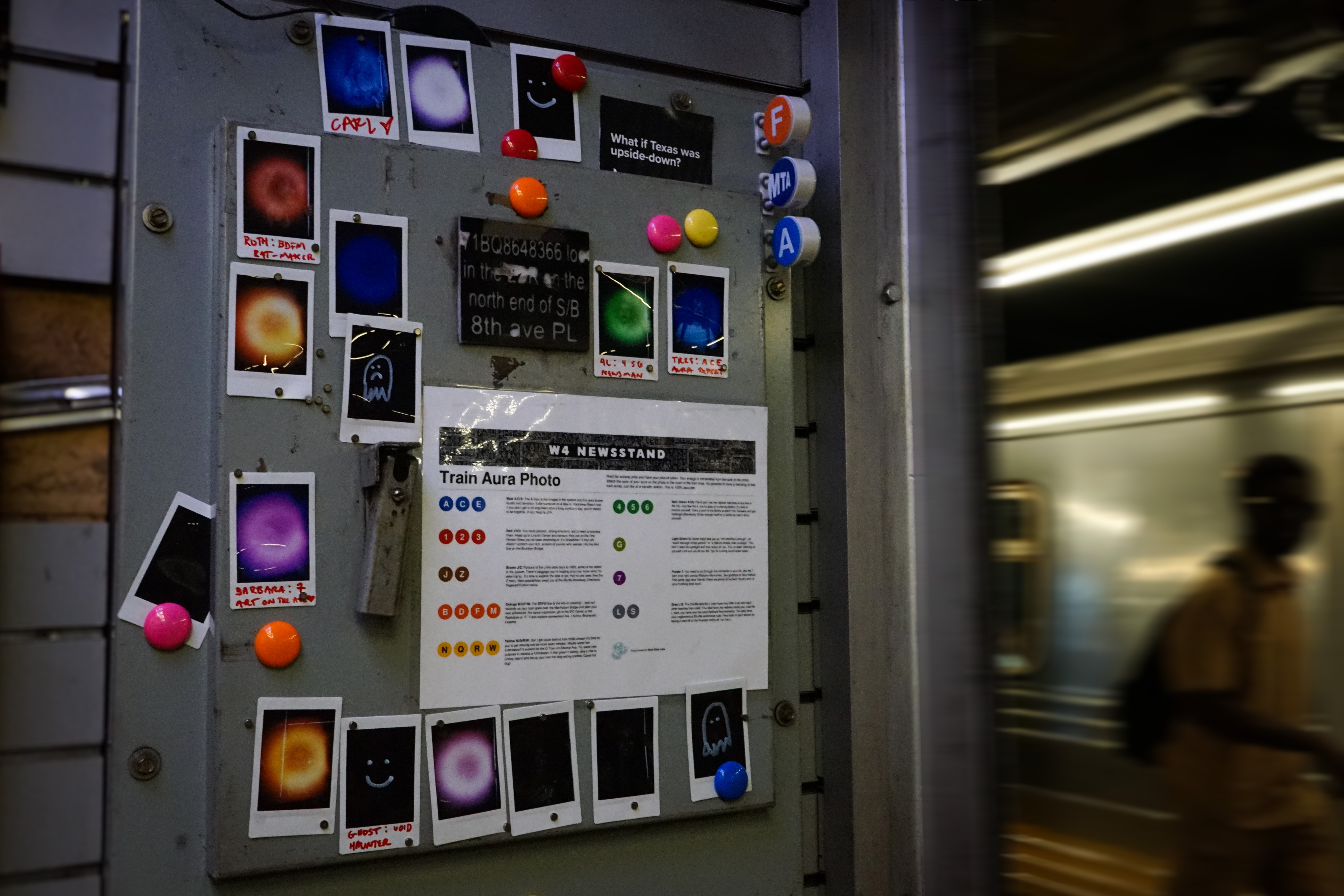 Al Mullen's W 4th St newsstand featuring his "train aura" photobooth images.