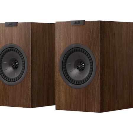 Two KEF bookshelf speakers in dark wood finish, with black speaker cones and the KEF logo at the top.
